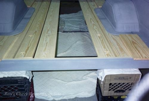 Photo of the new wood boards being test fitted in the bed